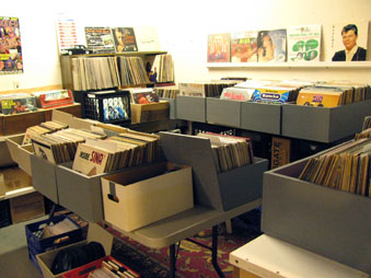 An assortment of used vinyl records.